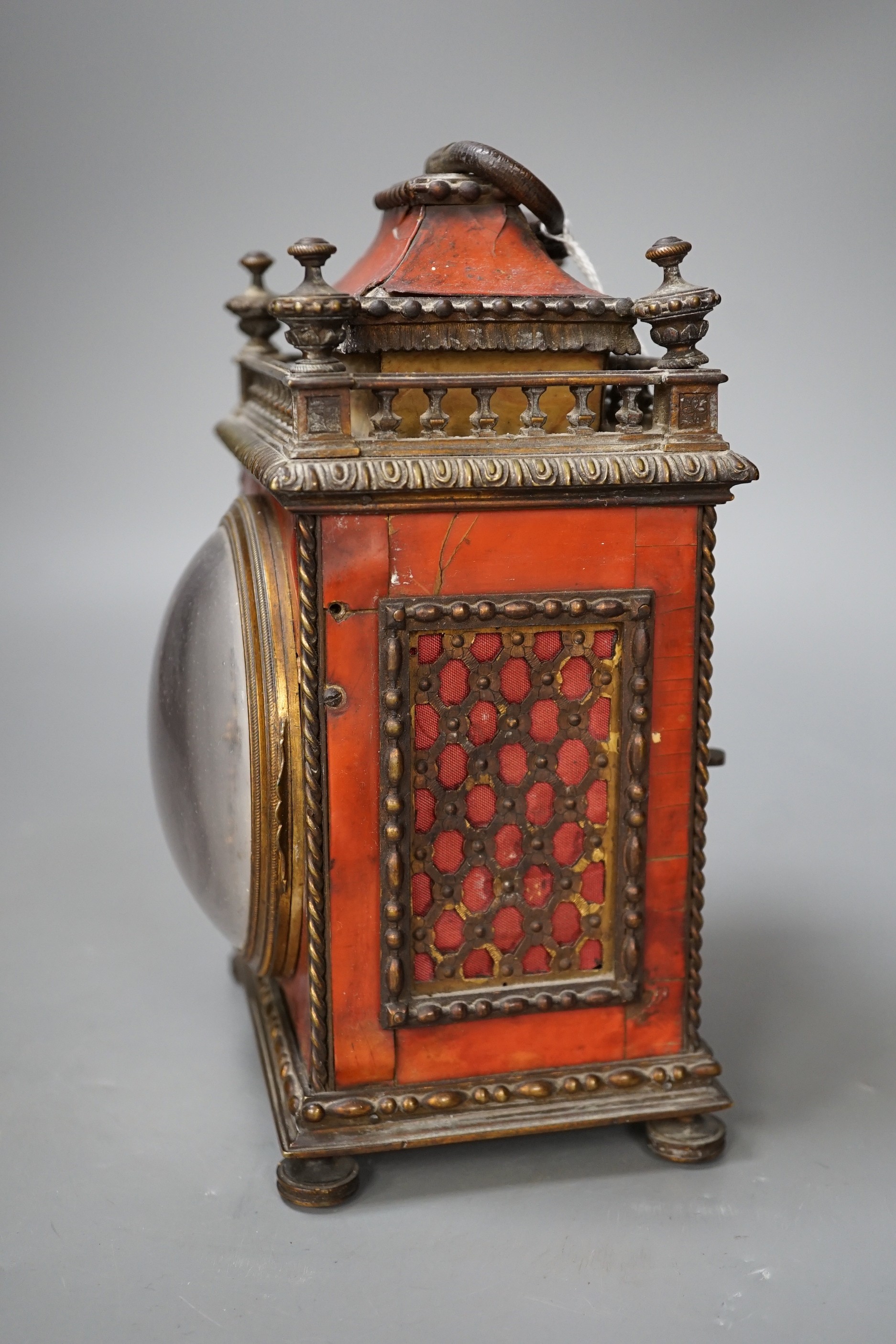 A 19th century French tortoiseshell mantel clock. 24cm high